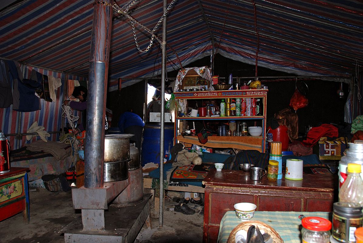 05 Inside Tibetan Kitchen Tent At Cho Oyu Chinese Base Camp I took a break from the cold wind at Cho Oyu Chinese Base Camp and ducked into one of the Tibetan Nomad kitchen tents and had a coke and enjoyed the ambiance.